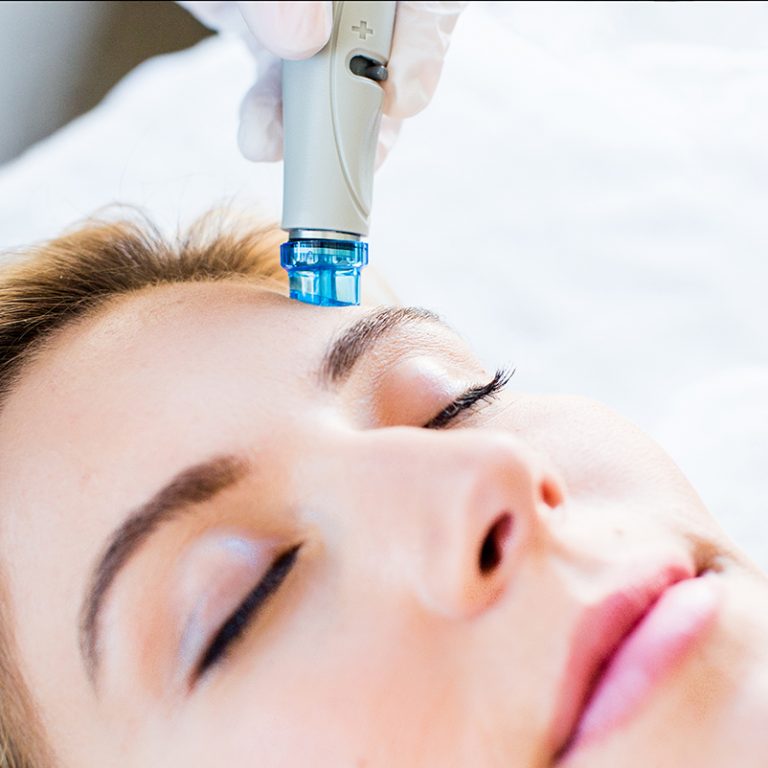 Image of woman receiving a hydrafacial treatment at a med spa in Louisville